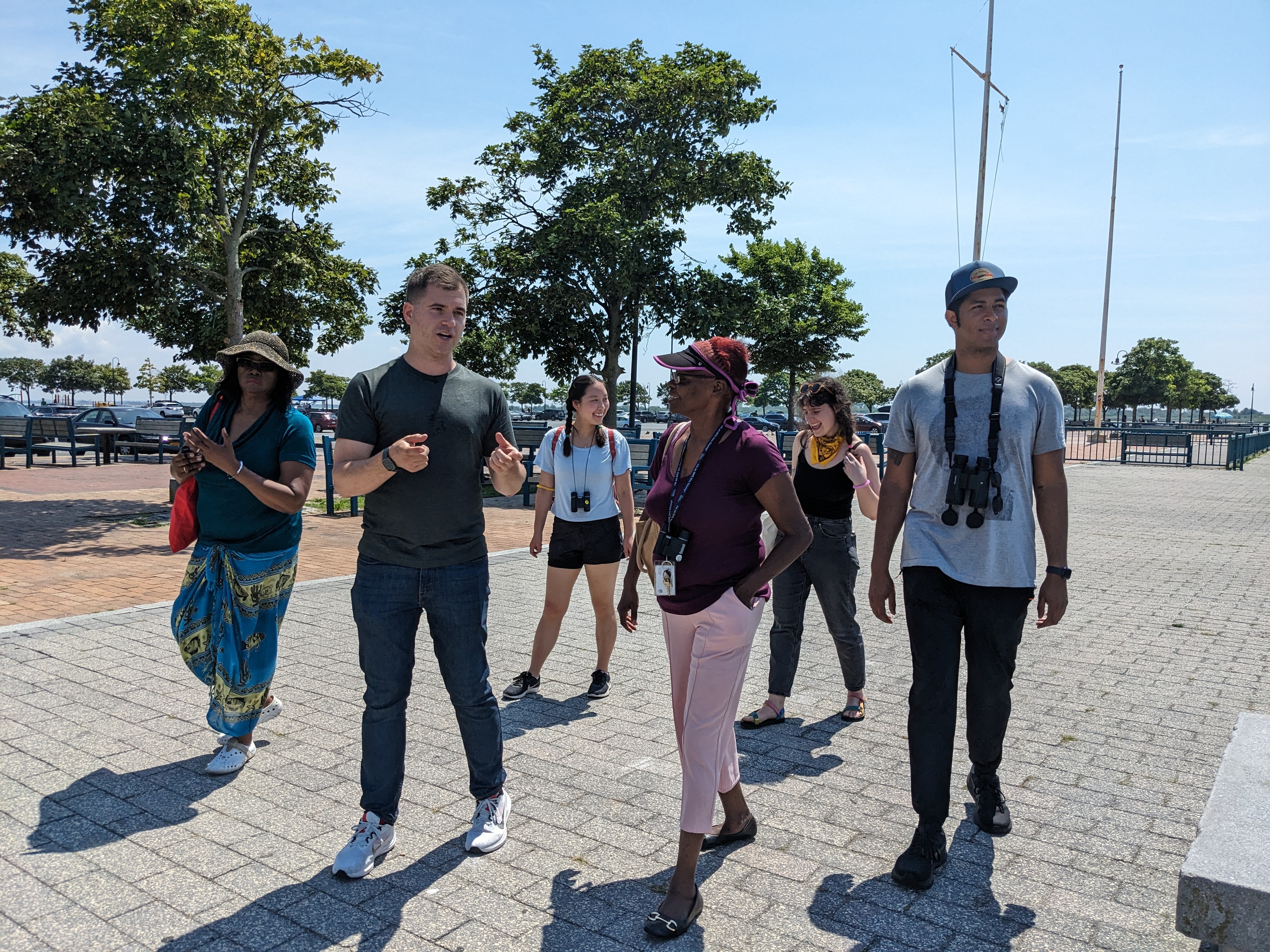 NYCHA in Nature outing participants walk along Canarsie Pier towards the Bay View Houses